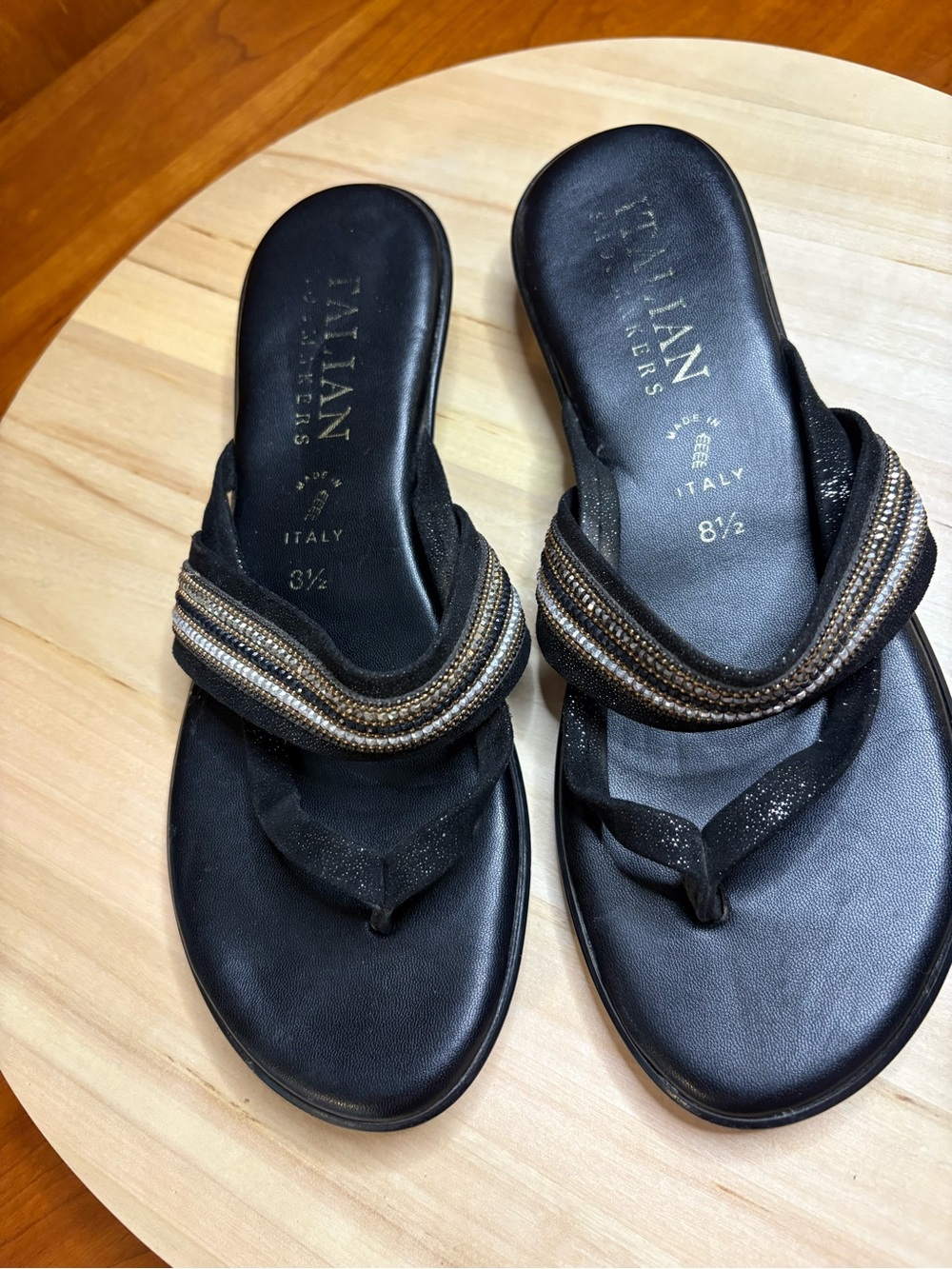 Italian Shoemakers branded sandals, featuring a distinctive beaded accent strap